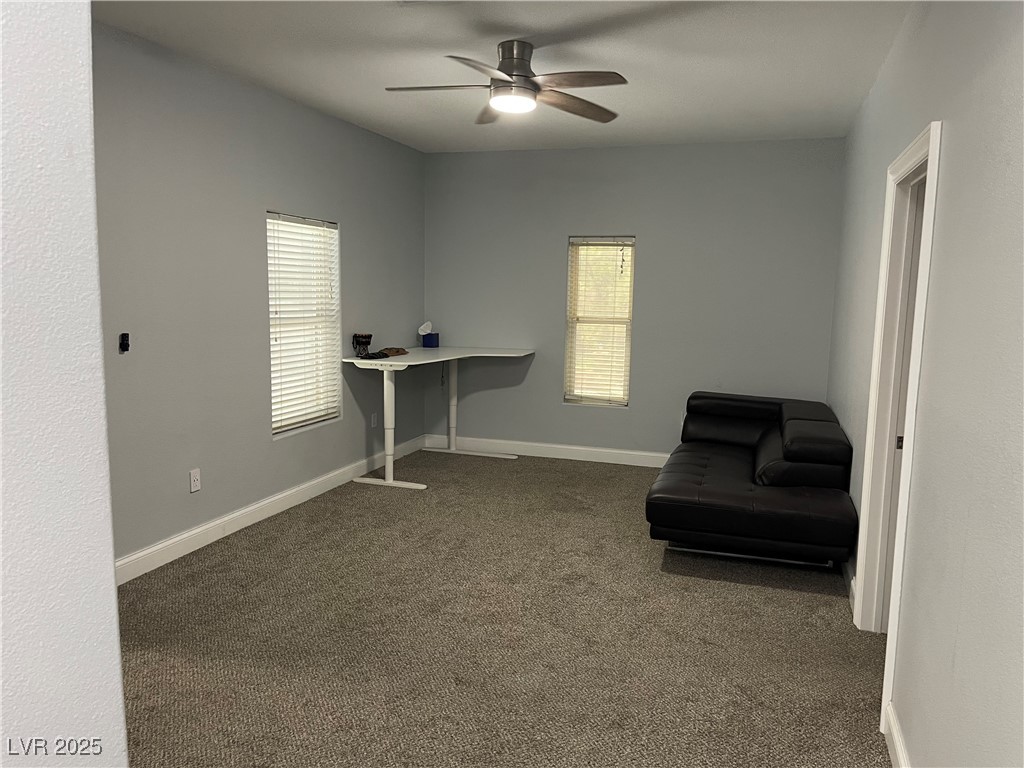 6480 West Oquendo Road Las Vegas, NV 89118 - Photo 44 of 51 The Loft with dark carpet and a ceiling fan