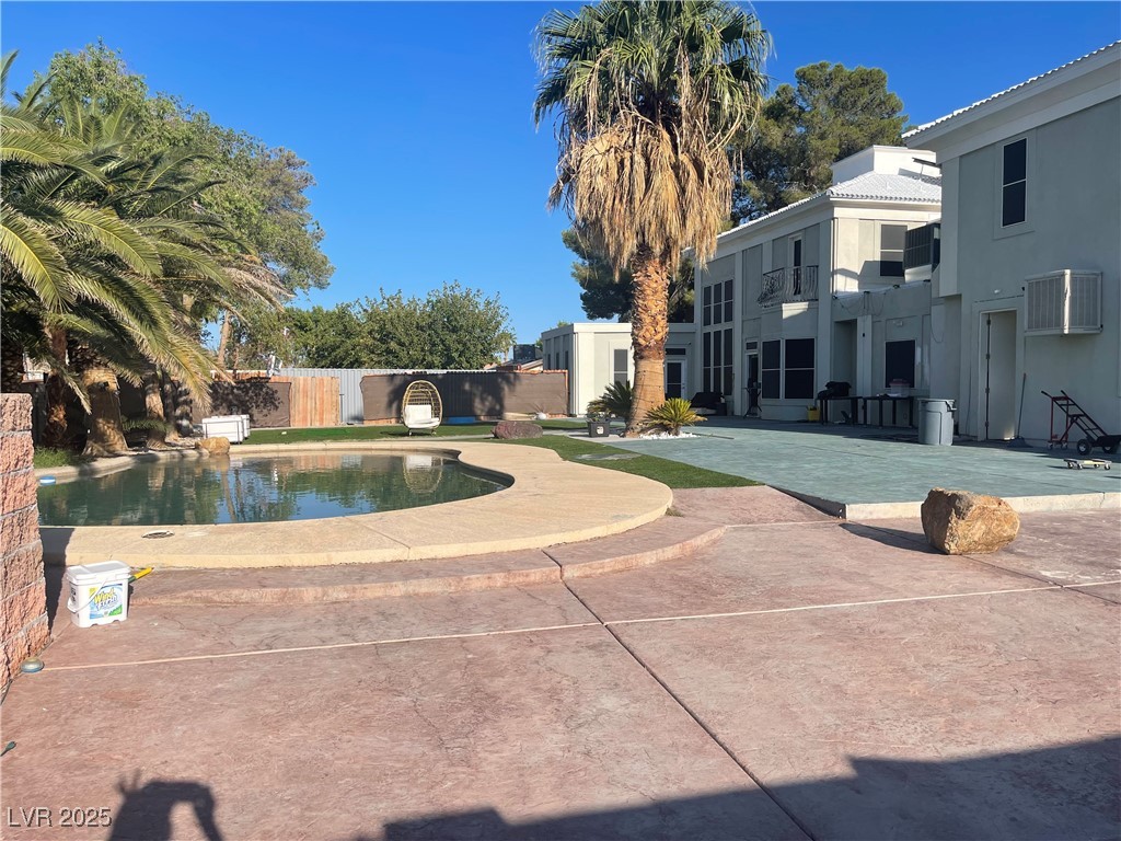 6480 West Oquendo Road Las Vegas, NV 89118 - Photo 47 of 51 View of swimming pool with a patio area