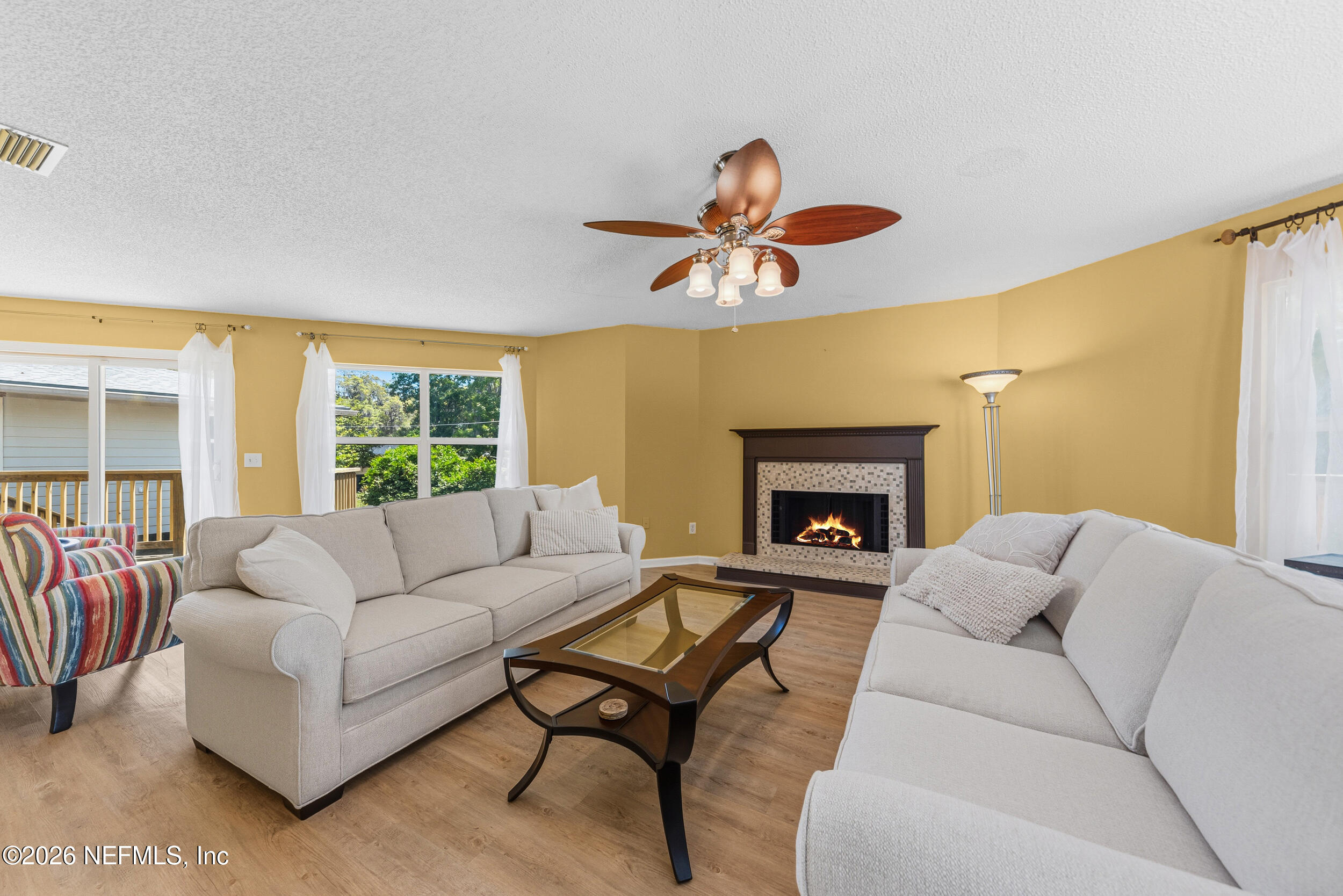 12707 Fort Caroline Road Jacksonville, FL 32225 - Photo 16 of 38 Living Room With Fireplace