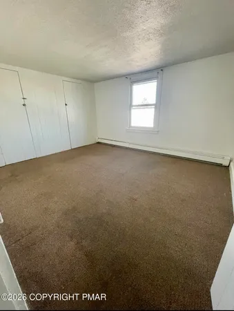 a view of a window in an empty room