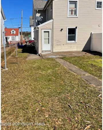 a view of a house with a patio