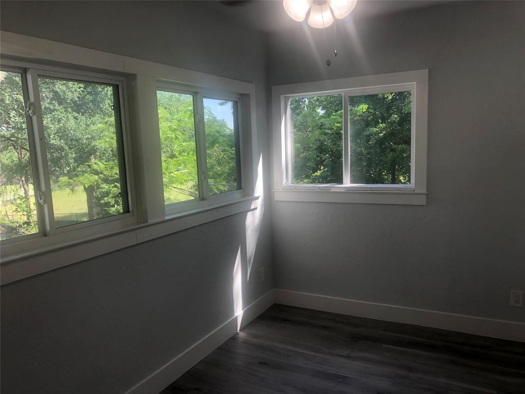 10310 Gail Road, Unit B Austin, TX 78748 - Photo 6 of 12 Sun-filled interior with plentiful windows overlooking verdant surroundings.
