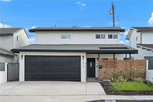a view of a house with a garage