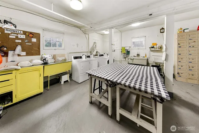 a view of a kitchen with furniture and window