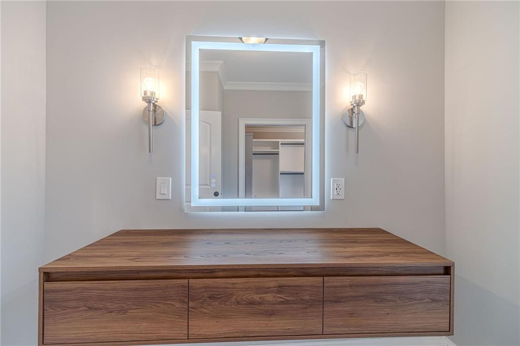 4720 Bold Springs Road Monroe, GA 30656 - Photo 39 of 83 a bathroom with a sink vanity and mirror