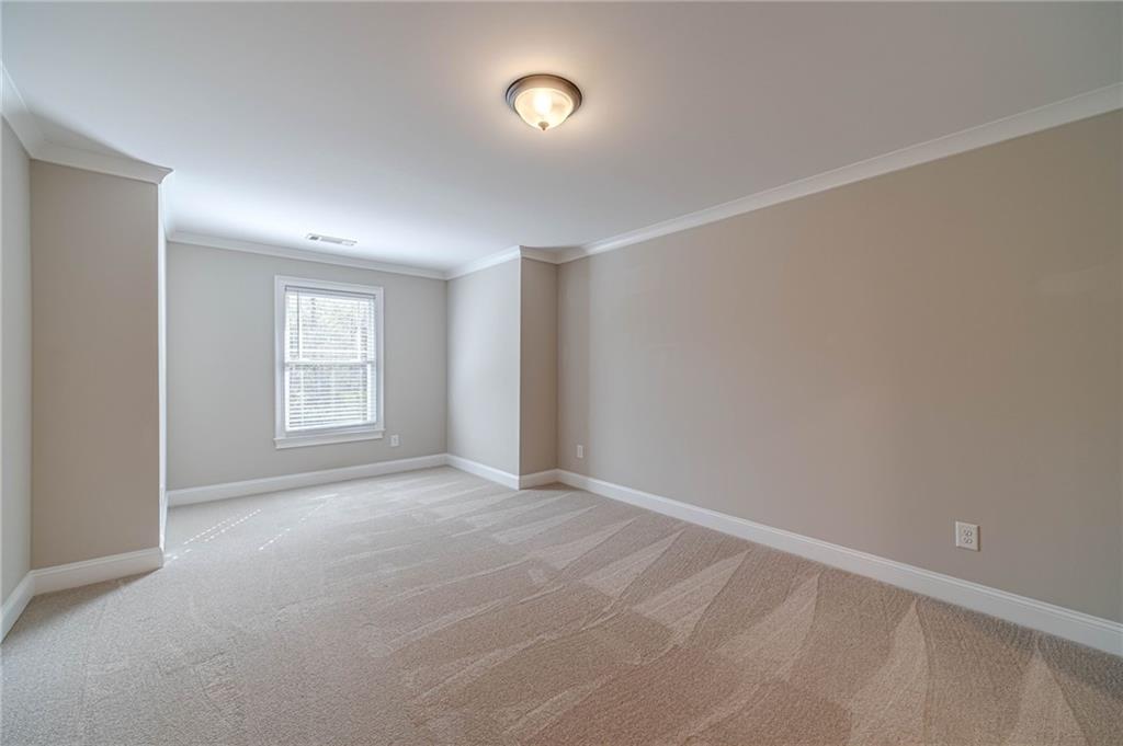 4720 Bold Springs Road Monroe, GA 30656 - Photo 48 of 83 an empty room with windows and closet