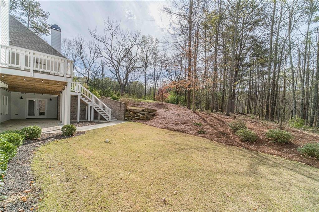 4720 Bold Springs Road Monroe, GA 30656 - Photo 74 of 83 a view of a house with a snow in the yard