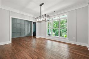 4720 Bold Springs Road Monroe, GA 30656 - Photo 10 of 83 a view of a room with window wooden floor and a chandelier