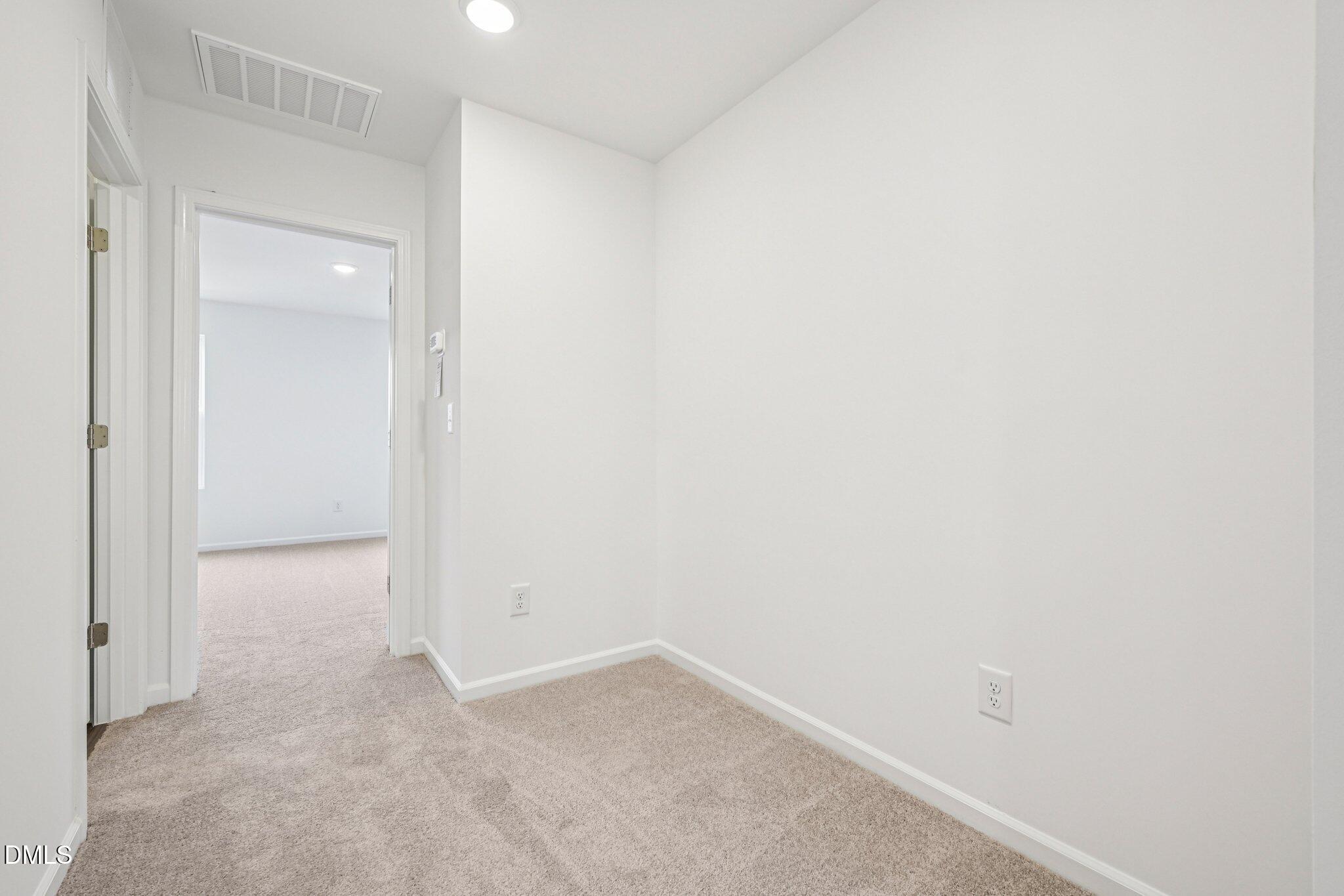 1522 Mirth Court Rolesville, NC 27571 - Photo 15 of 34 a view of an empty room