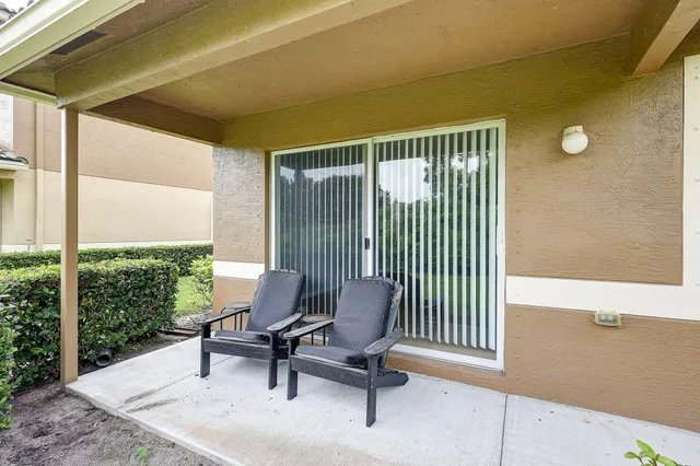 a building outdoor space with patio furniture