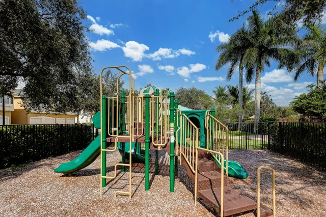 a view of a park with a slide