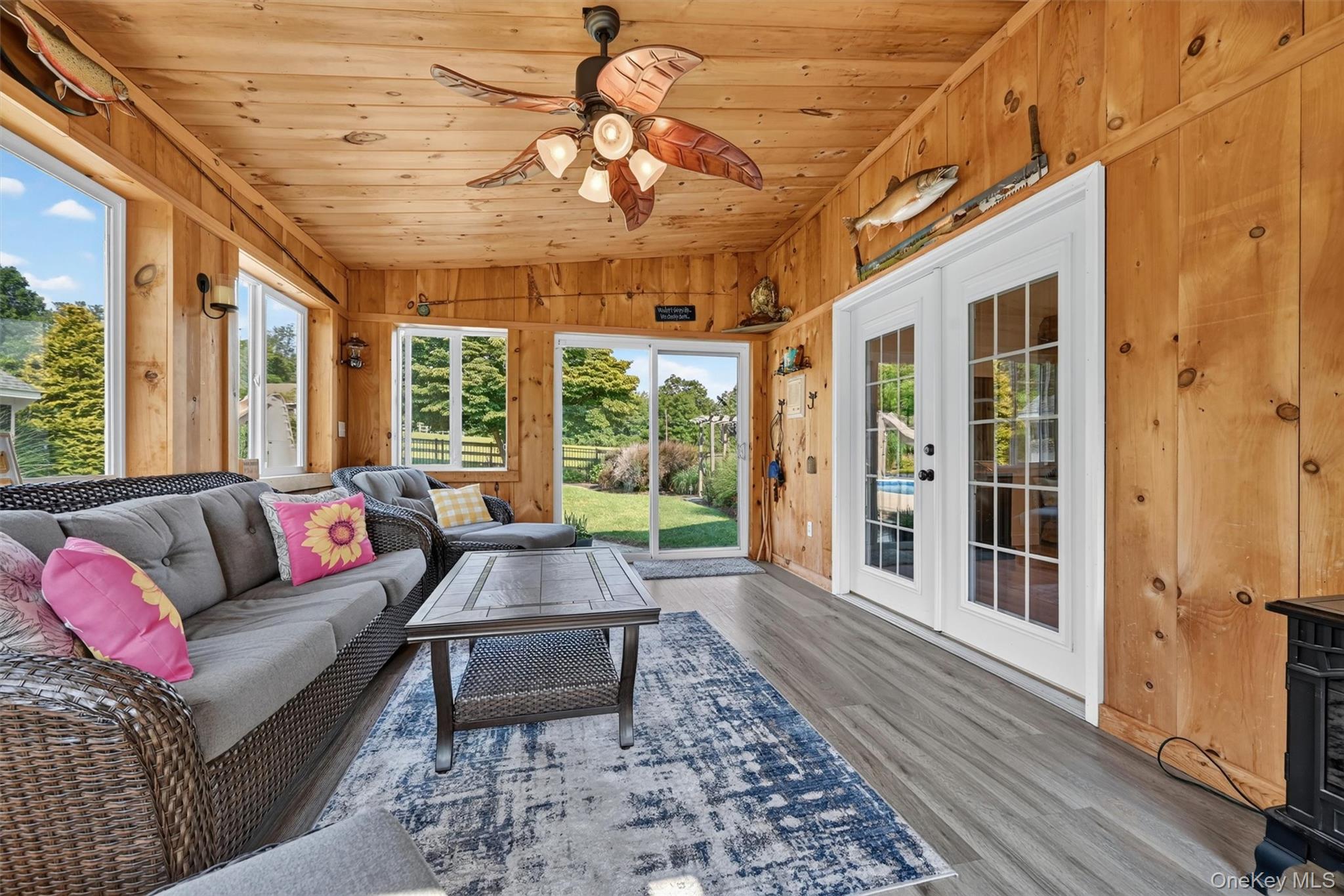 5 Hedges Road Warwick, NY 10990 - Photo 21 of 48 A peaceful screened-in sunroom offers the perfect place to relax, enjoy the breeze, listen to the birds, and take in views of the private backyard.