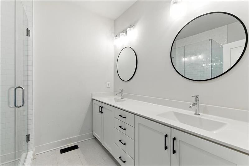 170 Color Circle Atlanta, GA 30317 - Photo 16 of 34 a bathroom with a sink and a mirror