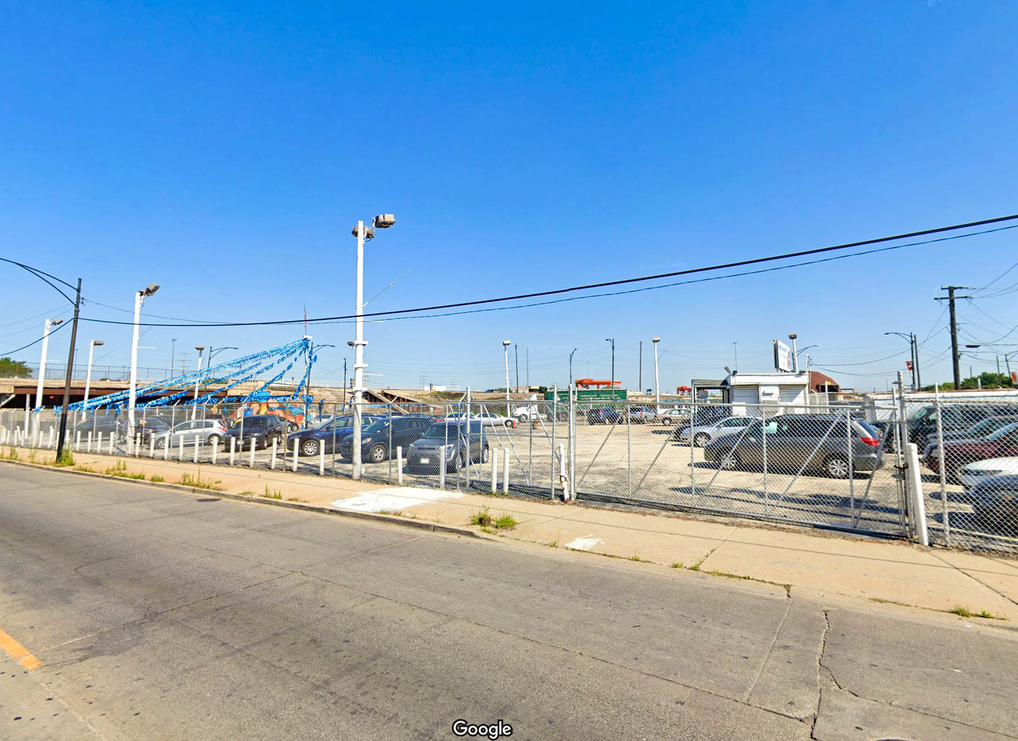 a view of a patio with a table and chairs