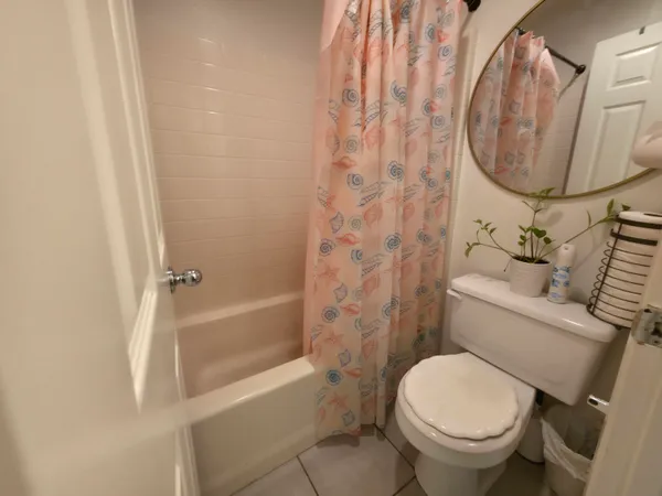 a bathroom with a toilet and a sink