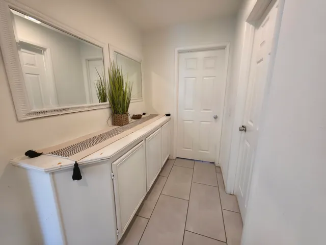 a view of a house with a snow in the background