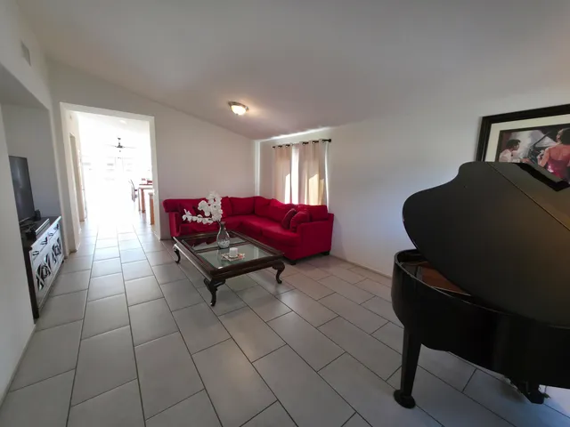 a room with furniture and a window