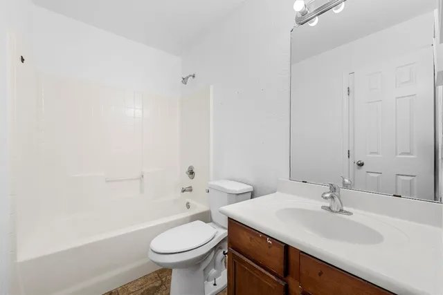 a bathroom with a sink toilet and a bathtub