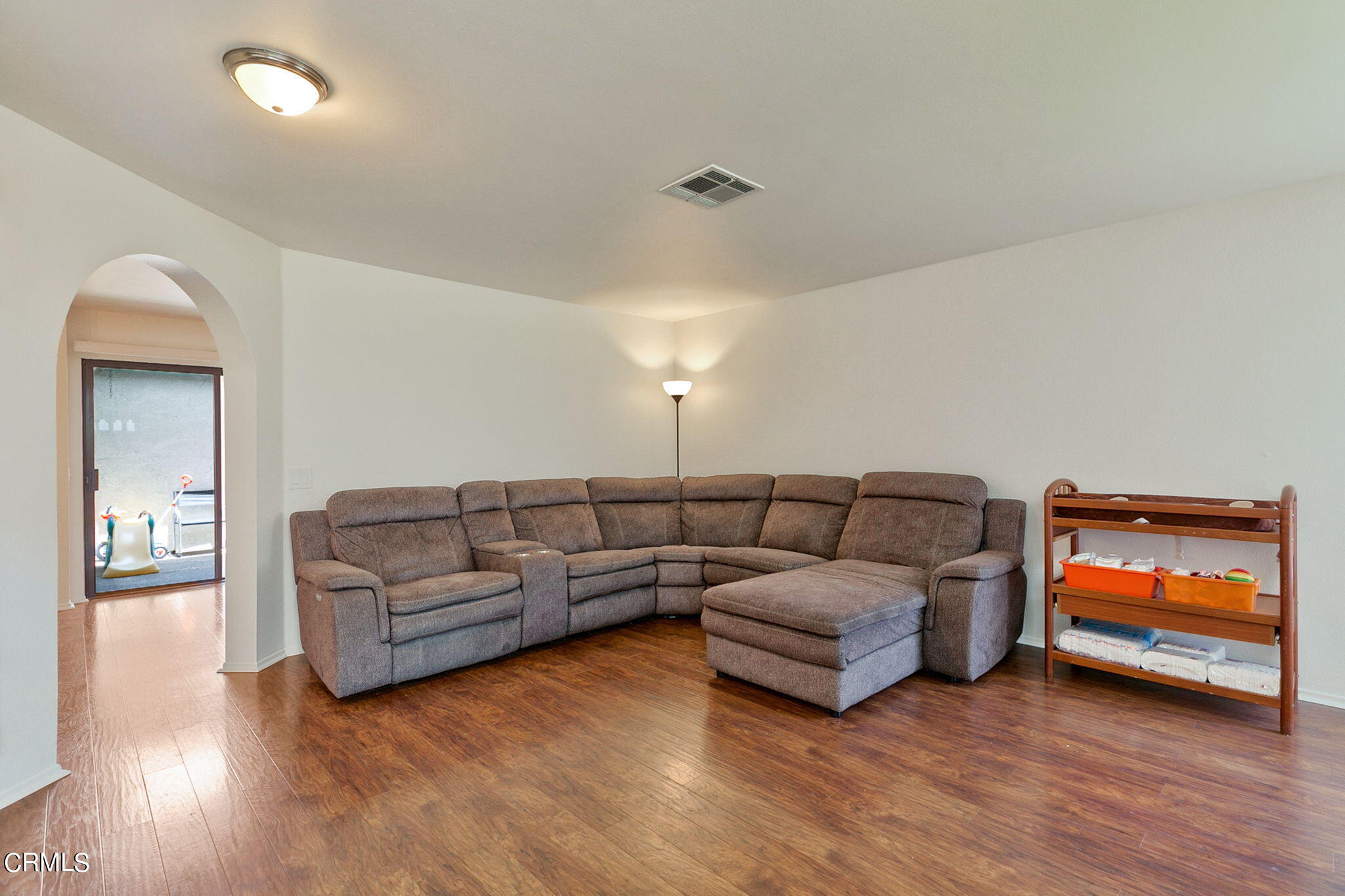 3524 Olds Road Oxnard, CA 93033 - Photo 7 of 43 a living room with furniture and a wooden floor
