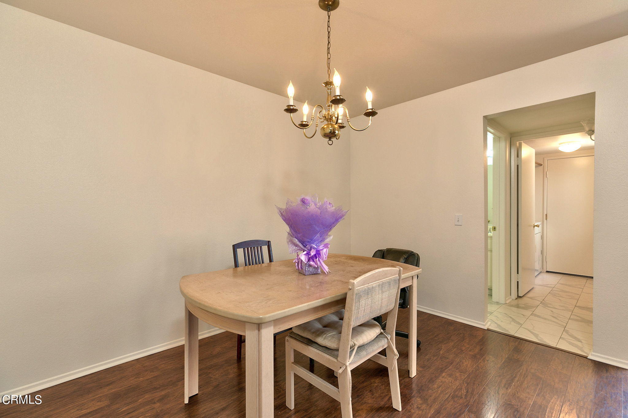 3524 Olds Road Oxnard, CA 93033 - Photo 8 of 43 a view of a dining room with furniture and wooden floor