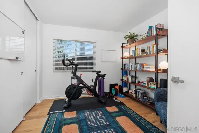a room with furniture and a book shelf
