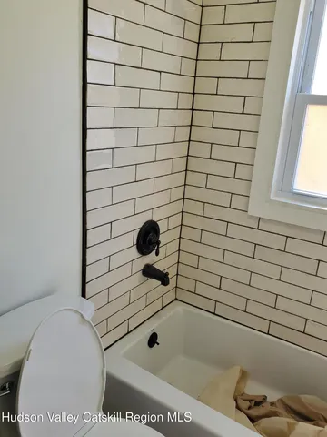 a bathroom with a bathtub