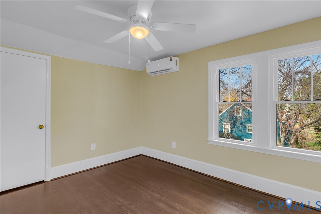 109 Courthouse Road Heathsville, VA 22473 - Photo 24 of 50 a view of an empty room with wooden floor and a window