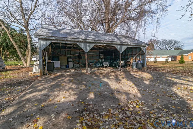 a view of a chairs and tables in the patio
