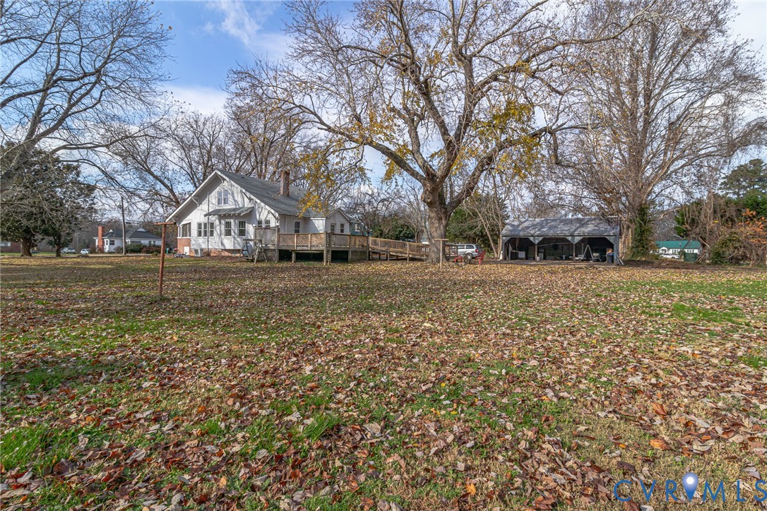 109 Courthouse Road Heathsville, VA 22473 - Photo 38 of 50 a view of a yard with a house and trees