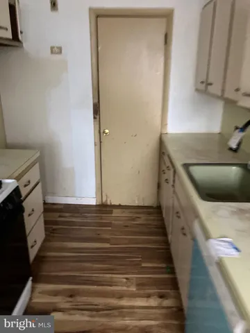 a view of room with window and furniture