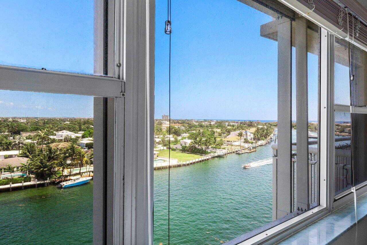 2611 North Riverside Drive, Unit 908 Pompano Beach, FL 33062 - Photo 12 of 43 a view of a lake from a window