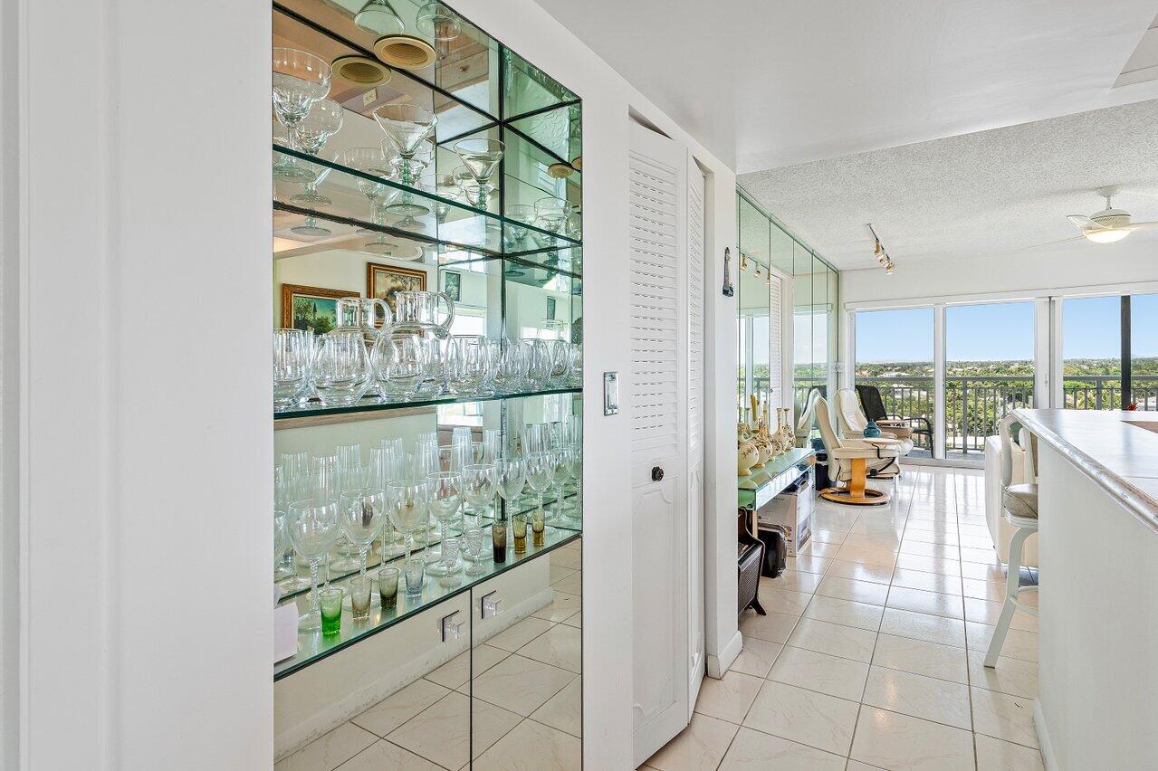 2611 North Riverside Drive, Unit 908 Pompano Beach, FL 33062 - Photo 30 of 43 a view of a living room and a floor to ceiling window