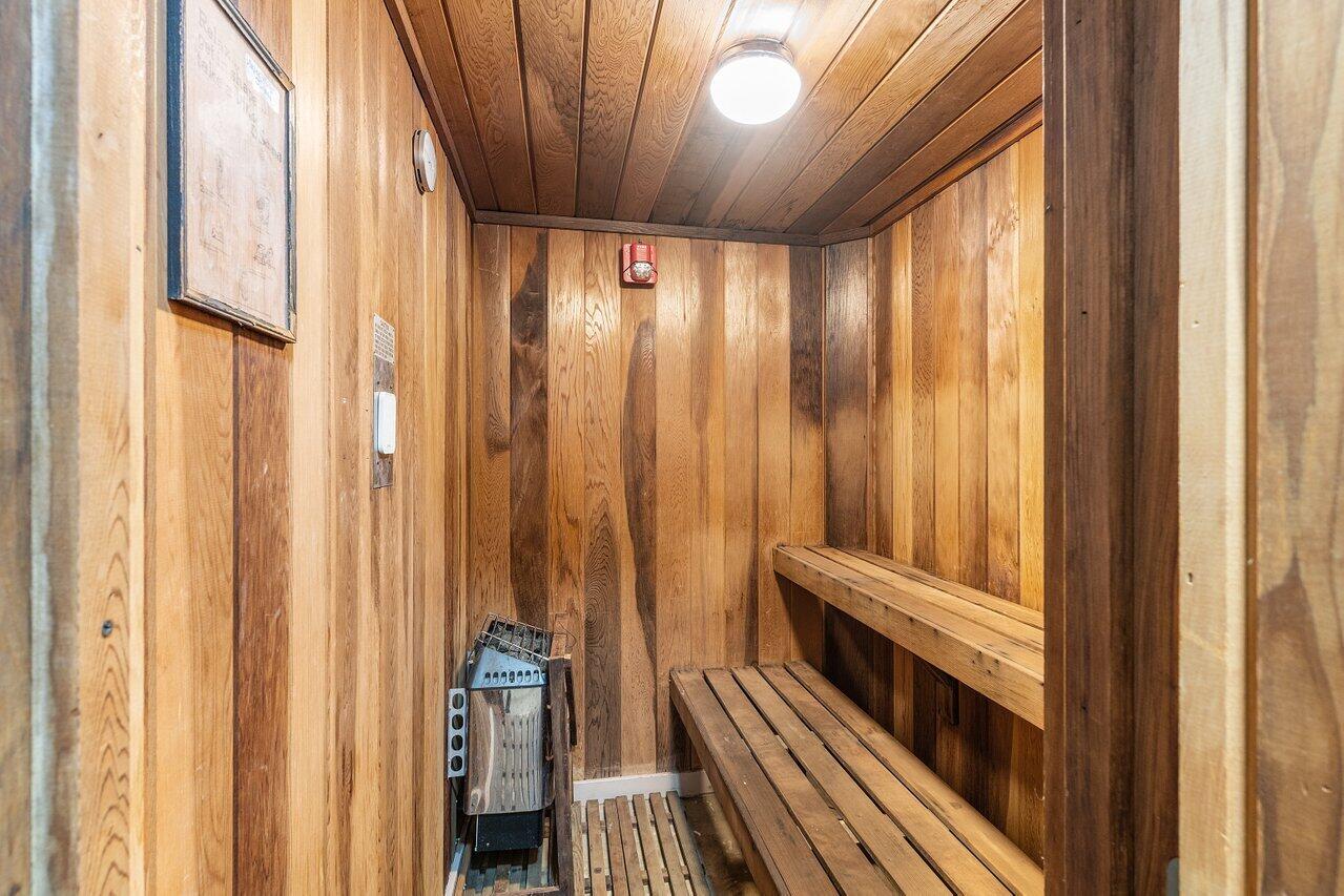 2611 North Riverside Drive, Unit 908 Pompano Beach, FL 33062 - Photo 42 of 43 a view of a room with wooden floor and staircase