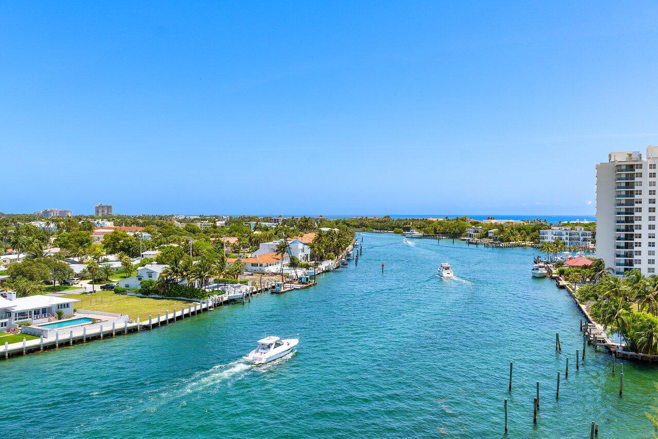 2611 North Riverside Drive, Unit 908 Pompano Beach, FL 33062 - Photo 6 of 43 a view of a lake with a yard