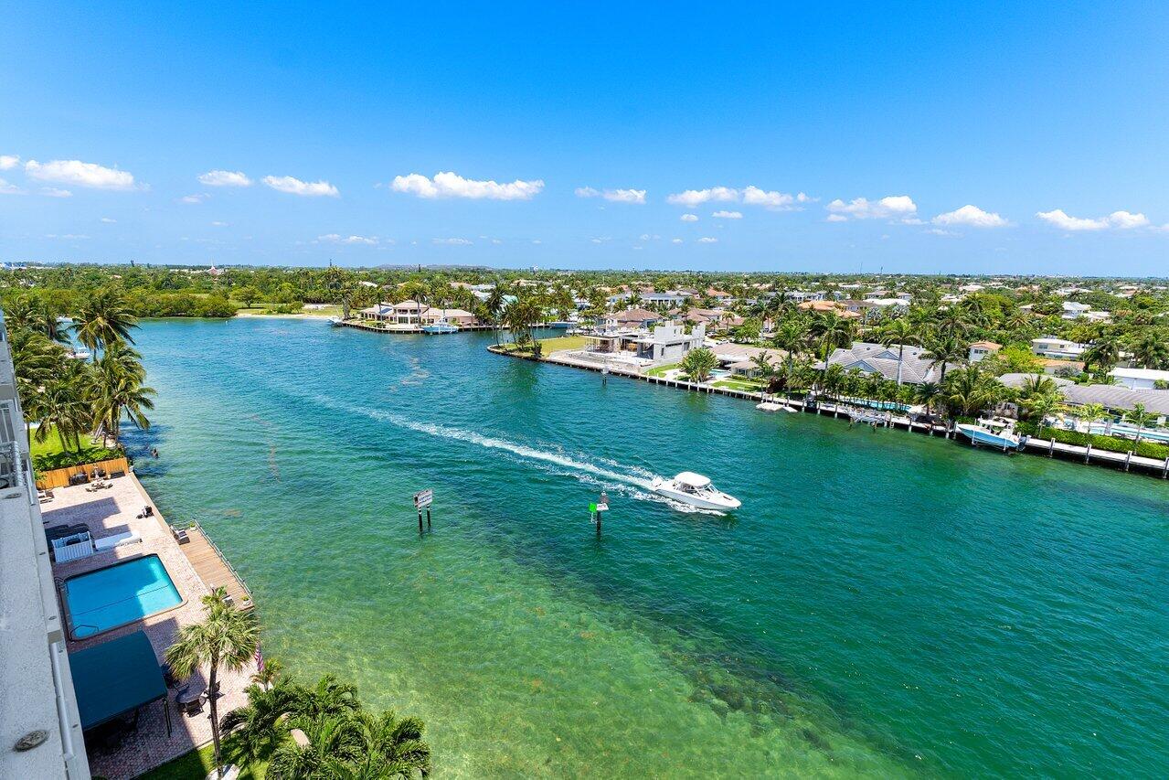 2611 North Riverside Drive, Unit 908 Pompano Beach, FL 33062 - Photo 7 of 43 a view of a lake in a city