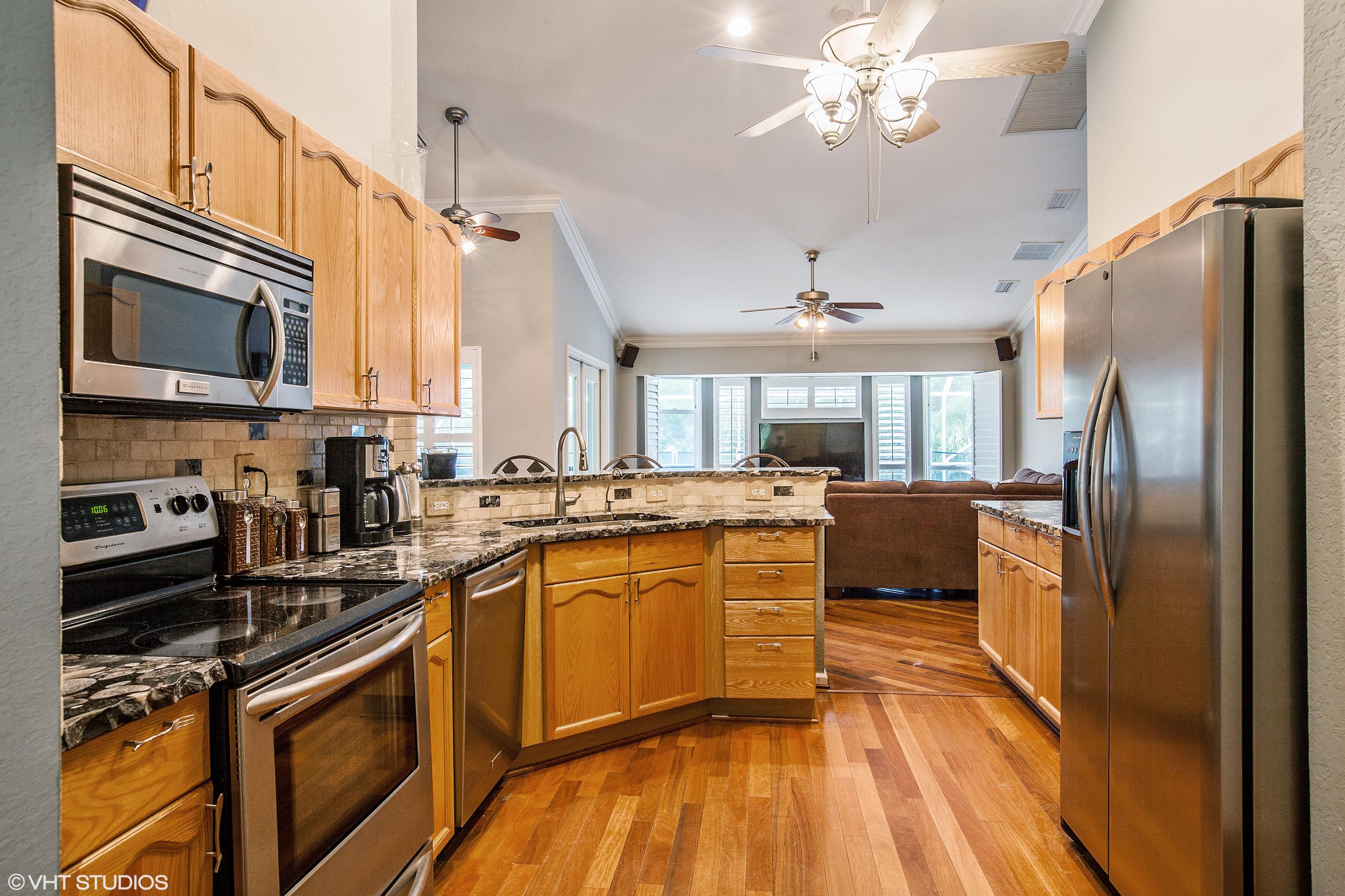 3759 D Road Loxahatchee Groves, FL 33470 - Photo 5 of 29 Kitchen to Family Room