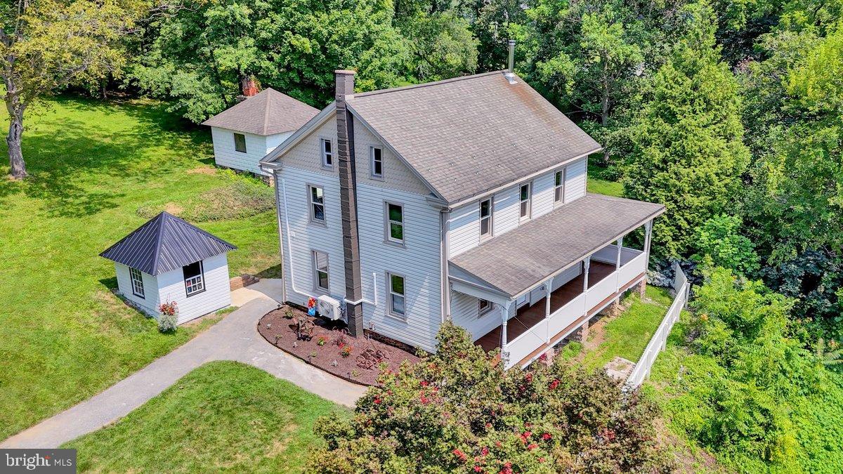 1069 Rawlinsville Road Willow Street, PA 17584 - Photo 1 of 47 an aerial view of a house with a big yard