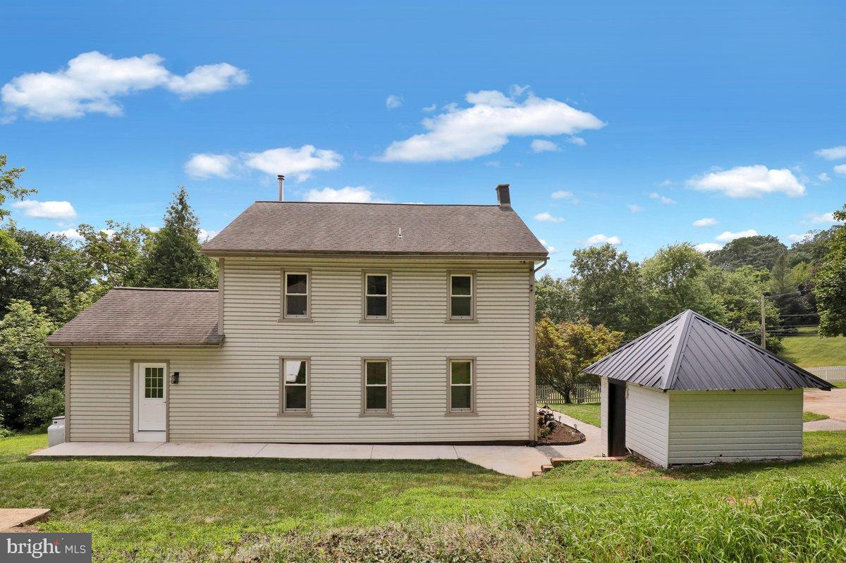 1069 Rawlinsville Road Willow Street, PA 17584 - Photo 44 of 47 a view of a house with a backyard