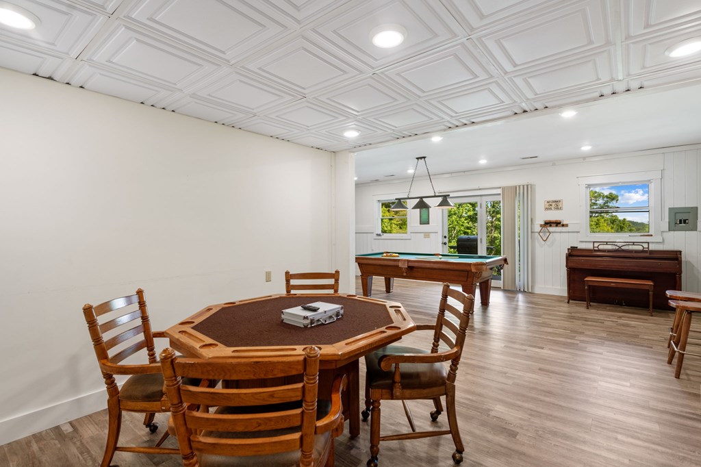 760 River Bend Lane Blue Ridge, GA 30513 - Photo 55 of 101 a view of a dining room with furniture window and wooden floor