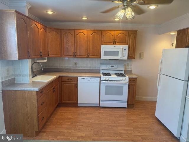 6315 Mershon Street Philadelphia, PA 19149 - Photo 7 of 19 a kitchen with a refrigerator stove and sink