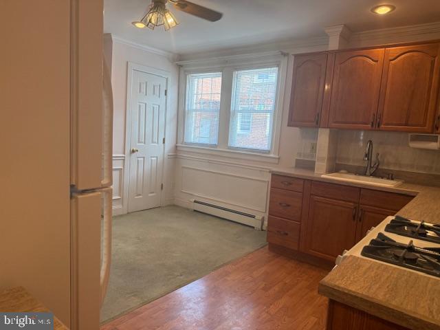 6315 Mershon Street Philadelphia, PA 19149 - Photo 8 of 19 a kitchen with sink cabinets and window