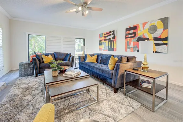 a living room with furniture and a window