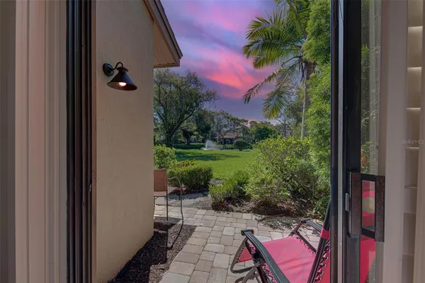a view of balcony and yard
