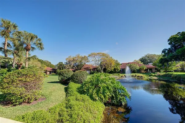 a view of a lake with a building in the background