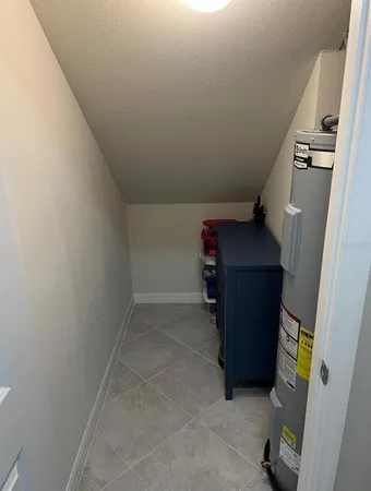 a view of a workspace with furniture