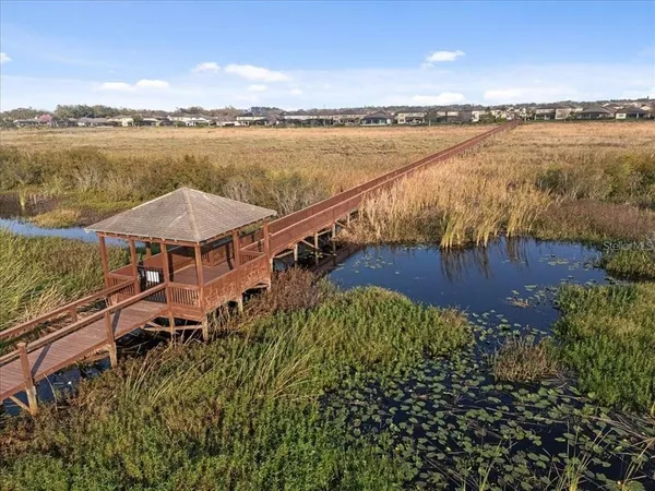 a view of a balcony with an ocean