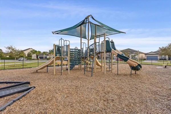a view of a swimming pool and a porch