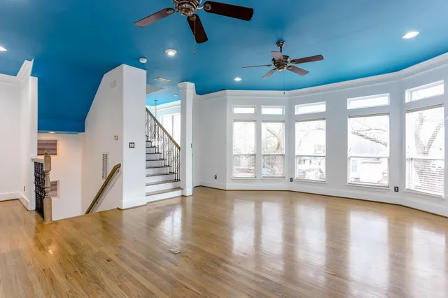 a view of an entryway with wooden floor