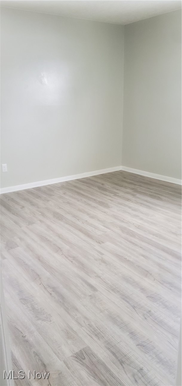 30151 Regent Road Wickliffe, OH 44092 - Photo 8 of 17 Unfurnished room with light wood-type flooring
