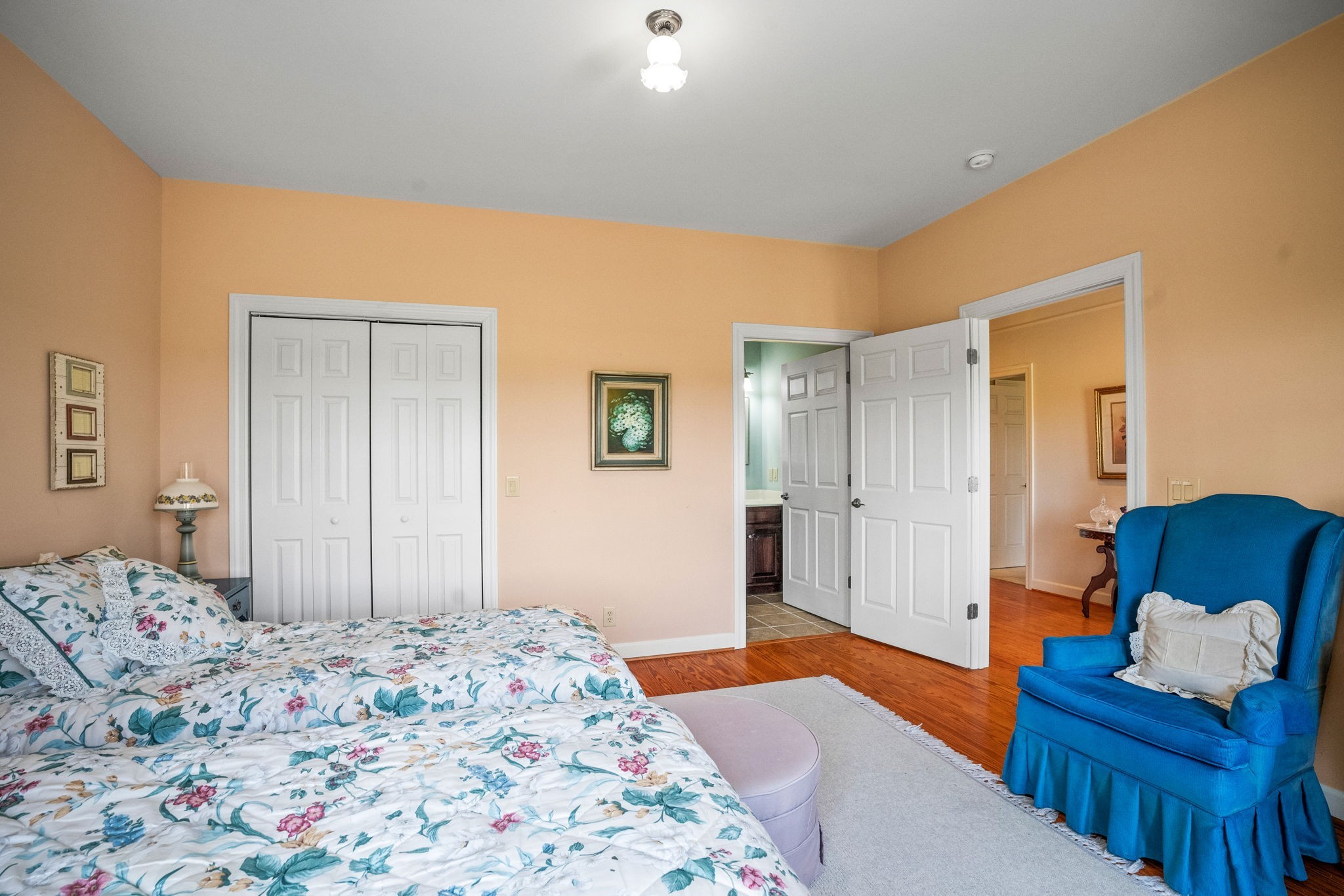 4313 South Garrett Road Springfield, TN 37172 - Photo 13 of 69 a bedroom with a bed and wooden floor